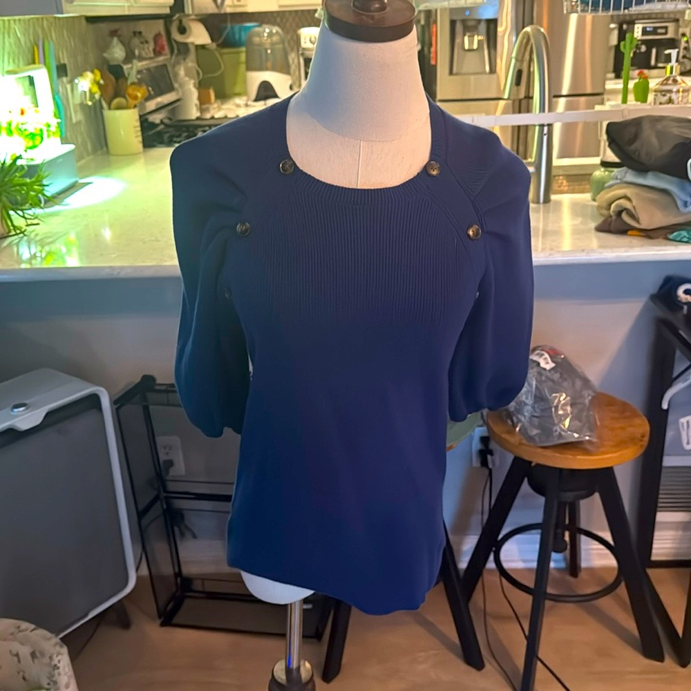 Ann Taylor’s 3/4 sweater with button design